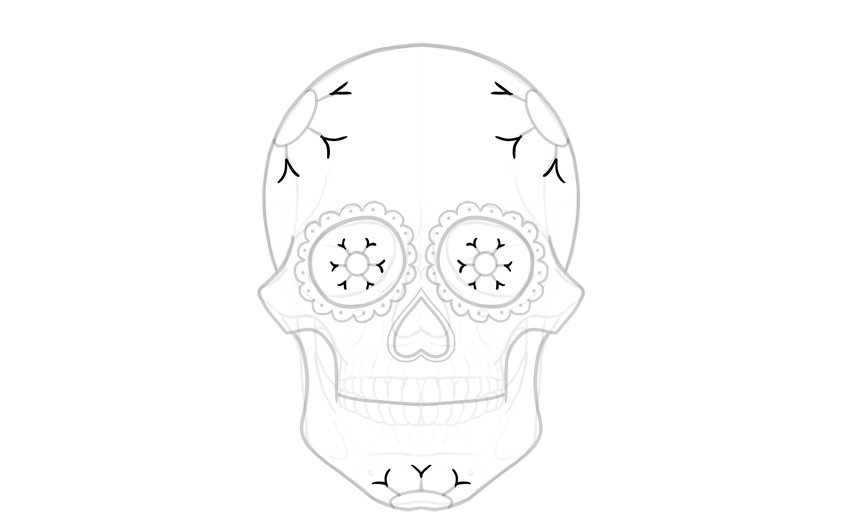 drawing a figure on a sugar skull