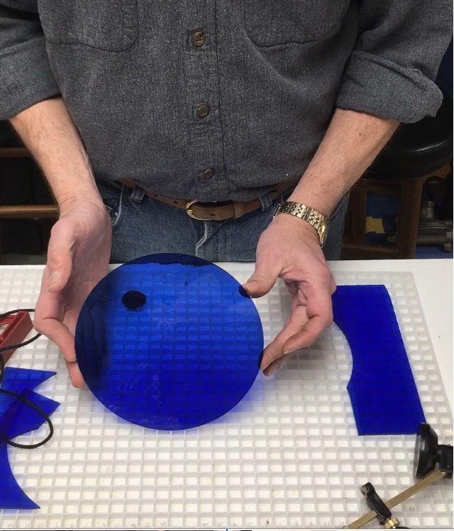 Testing a circular glass cutter on paper