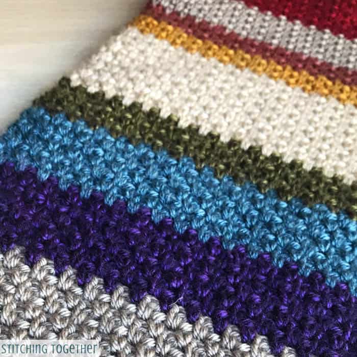 Pictures of multi-colored crocheted woolen scarf pins