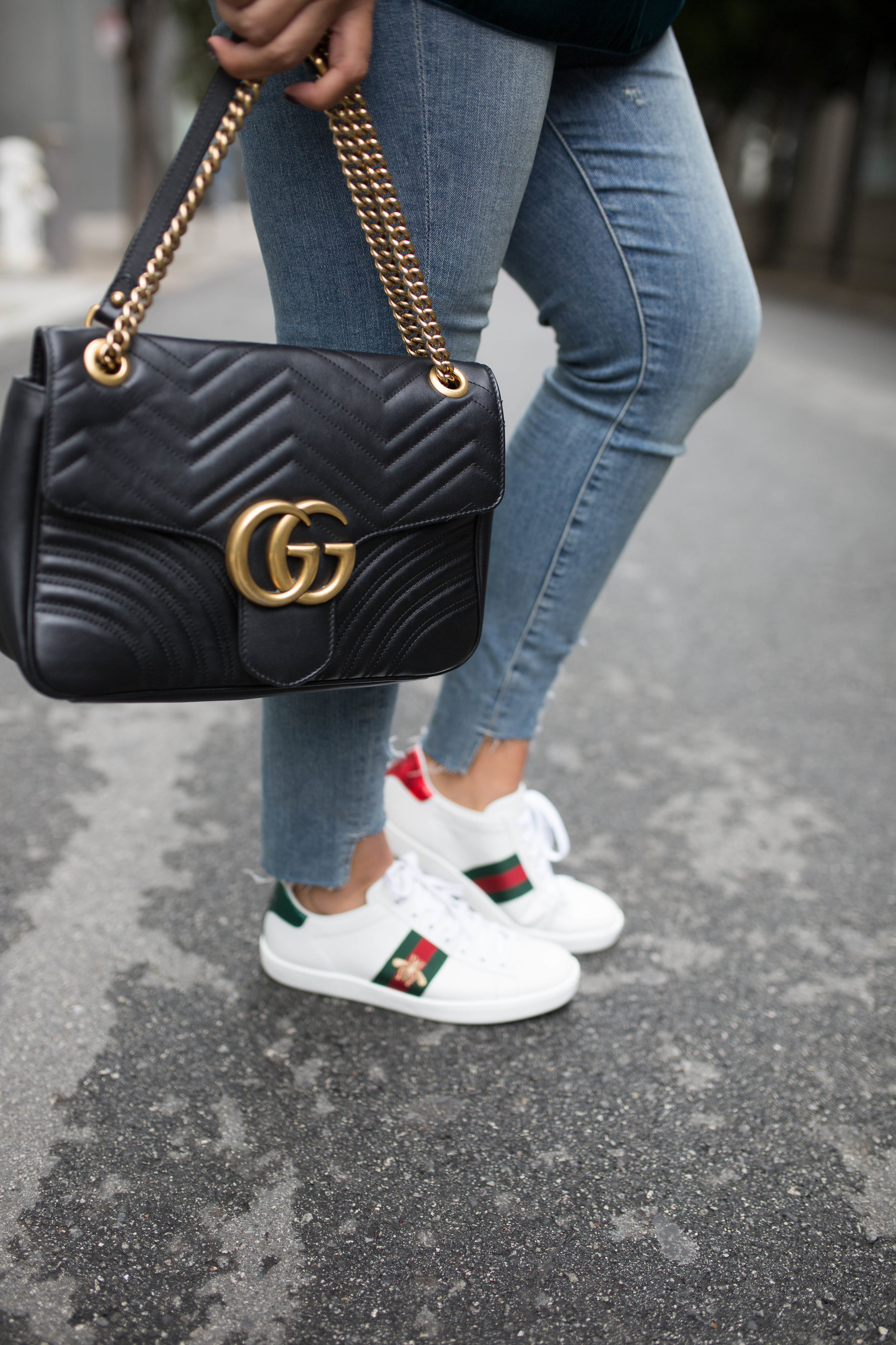 Ashley Zeal from Two Peas in a Prada shares how to clean Gucci sneakers. She is using Jason Markk shoes