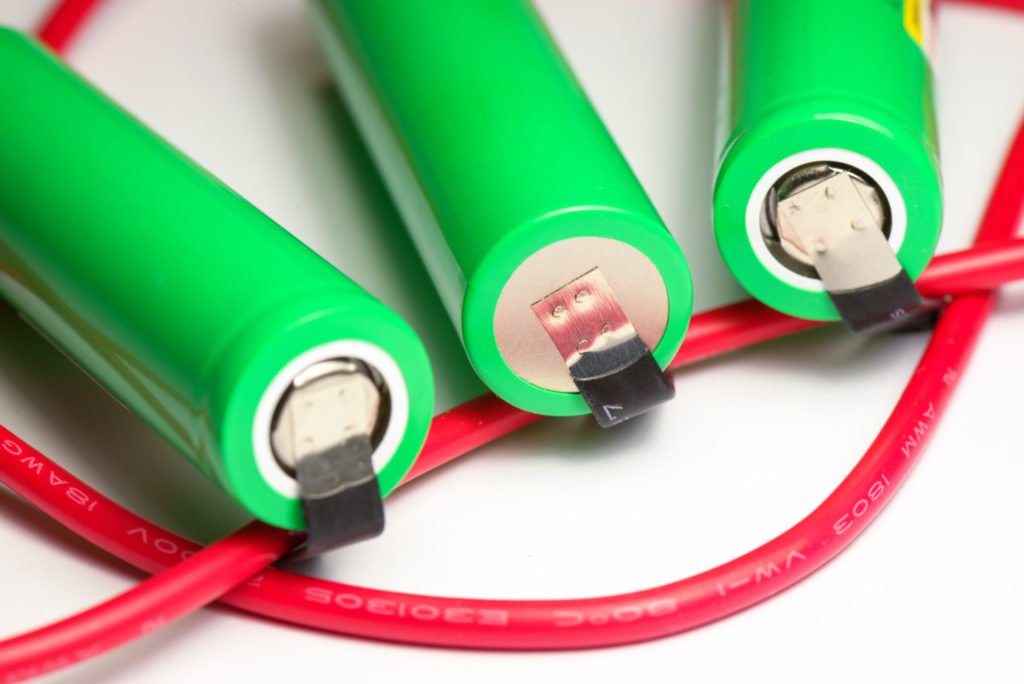 Lithium-ion battery with red wire.