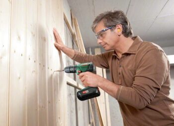 man using power tool