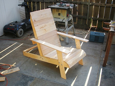 a pallet adirondack chair before staining or painting