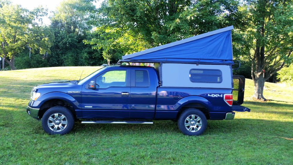 Camping truck with pop-up roof
