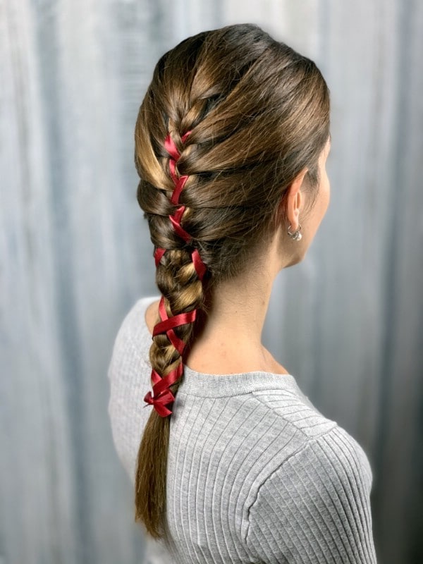 The back of the braid with ribbon