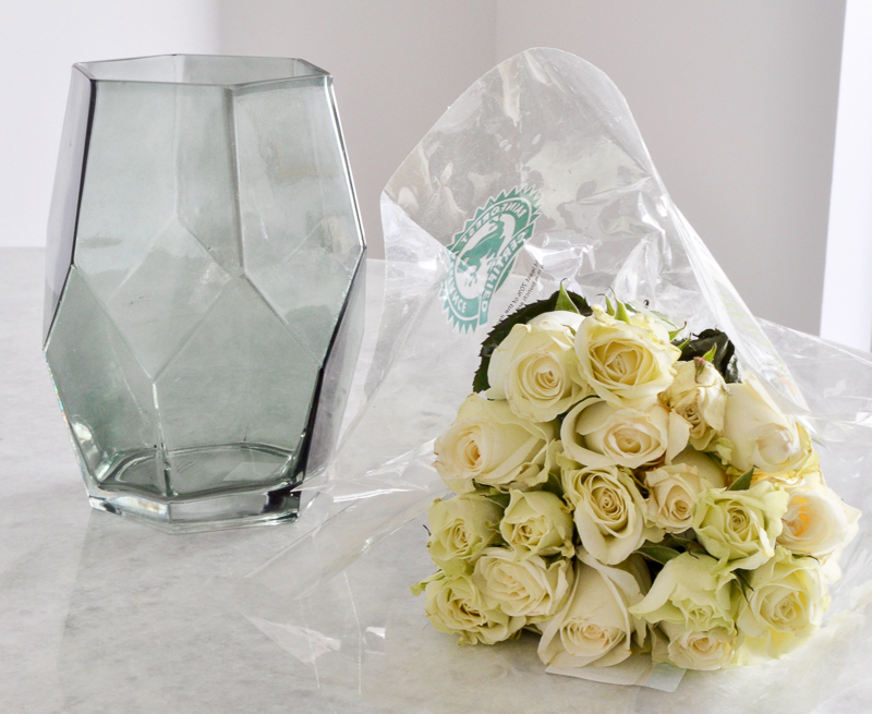 The supplies you need to arrange roses in a glass vase