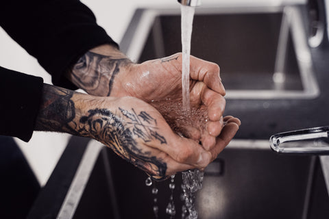 How to wash hands for tattoos