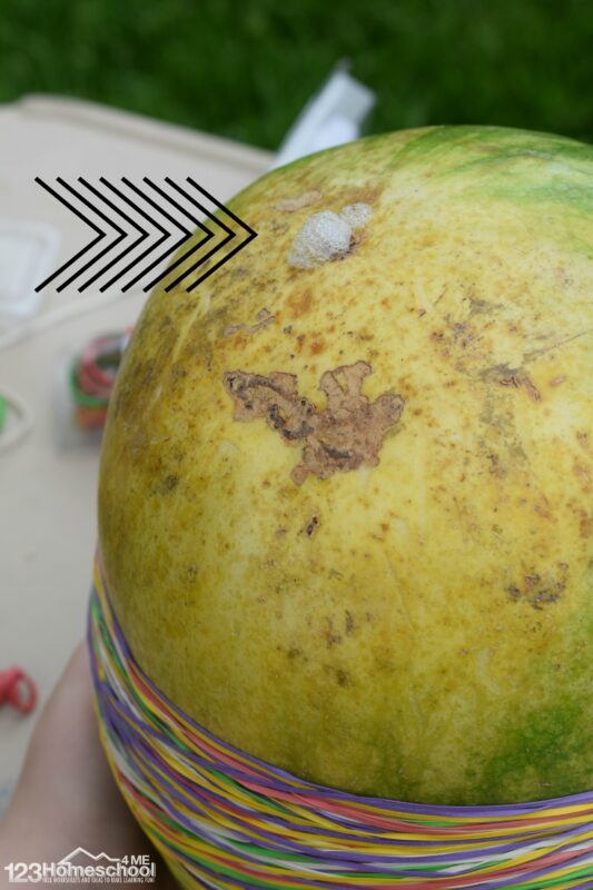 WOW your kids with this Watermelon Volcano! This summer activity for kids is a great way to sneak in a science experient.