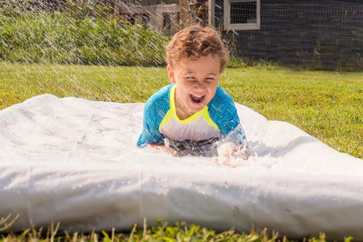 13. Make your own backyard waterslide